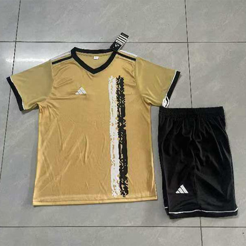 Sportswear adidas light yellow shirt black shorts white black lines on shirt